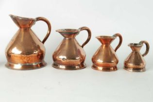 A GRADUATED SET OF 19TH CENTURY COPPER MEASURE JUGS (INC. BENHAM & FROUD)