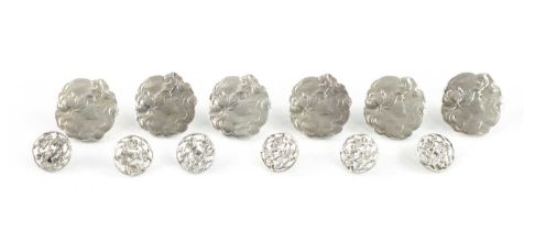 TWO SETS OF SIX SILVER BUTTONS