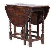 A 17TH CENTURY JOINED OAK GATELEG TABLE OF SMALL SIZE