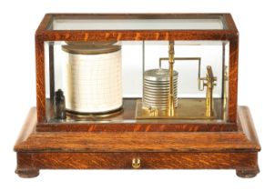 SHORT & MASON, LONDON. AN EARLY 20TH CENTURY OAK CASED BAROGRAPH