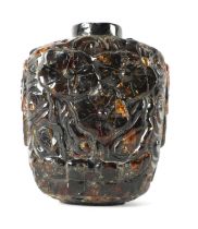 A CHINESE CARVED AMBER SNUFF BOTTLE