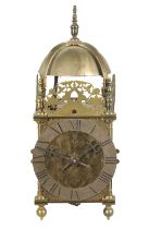 A BRASS WEIGHT DRIVEN LANTERN CLOCK