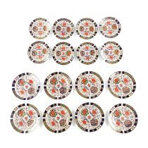 A SET OF CROWN DERBY PORCELAIN PLATES