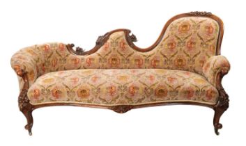 A VICTORIAN CARVED MAHOGANY CHAISE LOUNGE