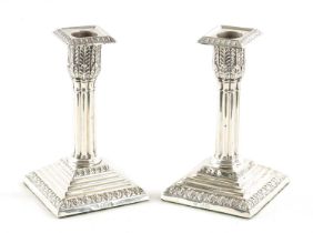 A PAIR OF LATE 19TH CENTURY SILVER CANDLESTICKS