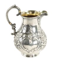 A VICTORIAN SILVER AND SILVER GILT ALE JUG