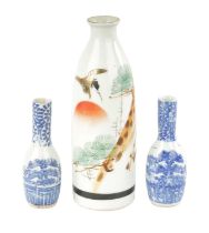 A PAIR OF CHINESE BLUE AND WHITE SPILL VASES AND A LARGER JAPANESE VASE