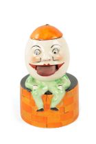 A CARLTON WARE HUMPTY DUMPTY STAMP LICKER