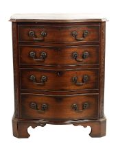 A 20TH CENTURY SERPENTINE MAHOGANY CHEST OF DRAWERS