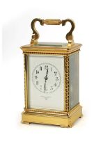 A LARGE FRENCH STRIKING CARRIAGE CLOCK