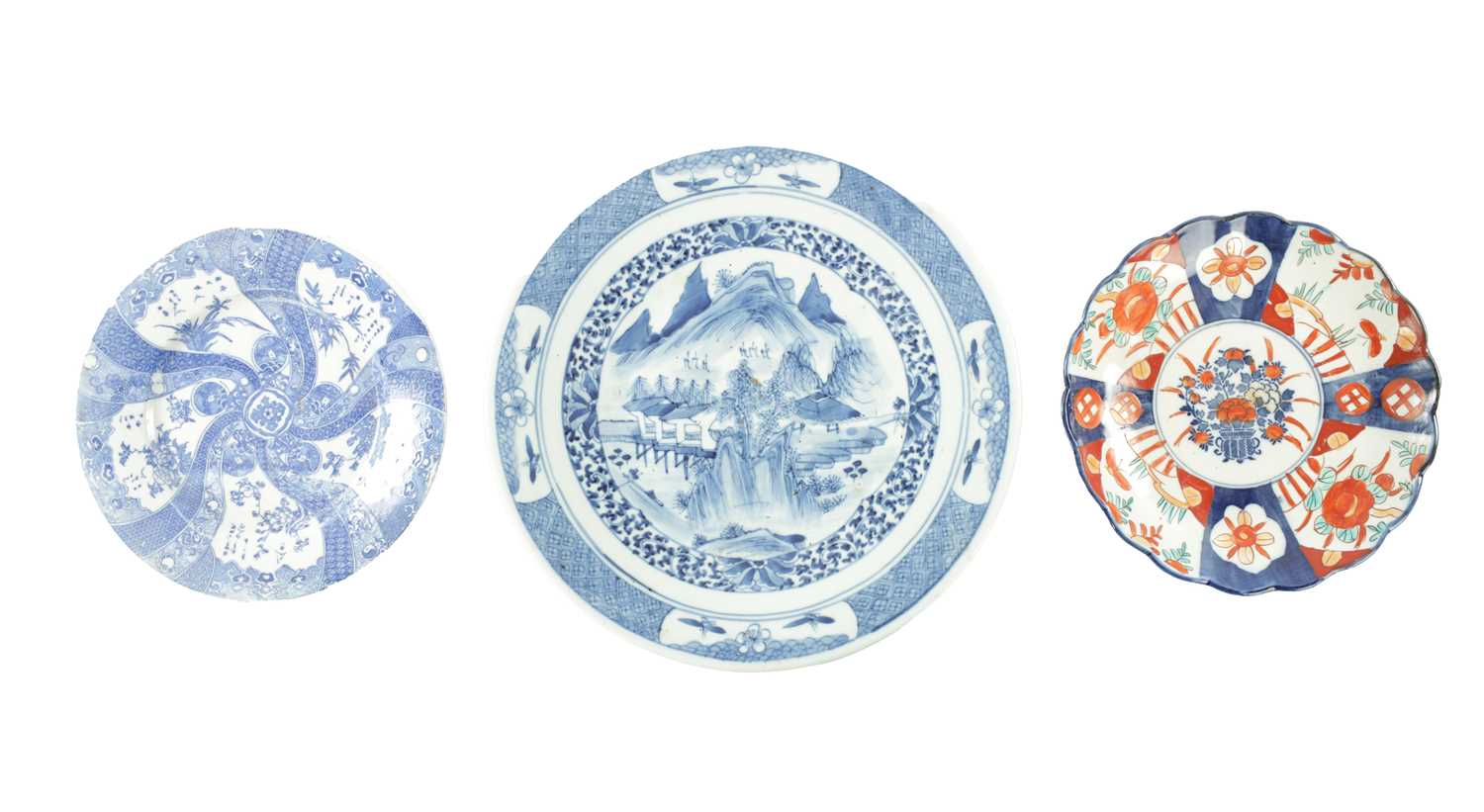 A COLLECTION OF THREE ORIENTAL SERVING PLATES