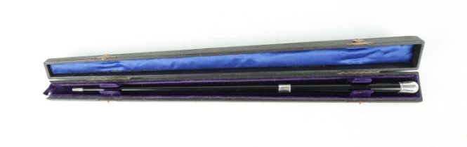 AN EARLY 20TH CENTURY SILVER MOUNTED AND EBONISED ORCHESTRATORS BATON