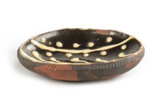 A SMALL 19TH CENTURY SLIPWARE DISH