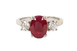 AN 18CT WHITE GOLD DIAMOND AND RUBY LADIES RING