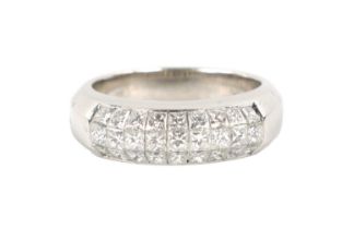 AN 18CT WHITE GOLD AND DIAMOND ETERNITY RING