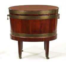 A GEORGE III OVAL MAHOGANY WINE COOLER ON STAND