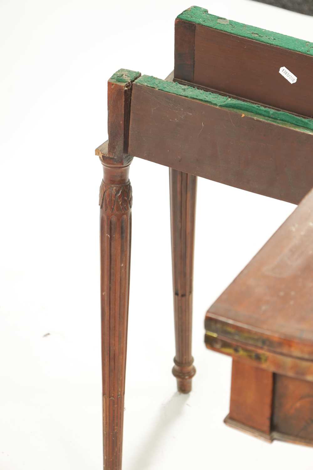 A LATE 18TH CENTURY DEMI LUNE CARD TABLE ON FLUTED LEGS IN THE MANNER OF GILLOWS - Image 5 of 7