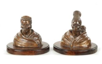 A PAIR OF 20TH CENTURY BRONZE SCULPTURES DEPICTING A ZULU WOMEN AND MAN BY PIERRE VAN RYNEVELD SIGNE