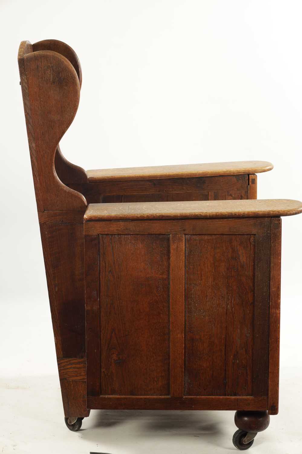AN ARTS AND CRAFTS METAMORPHIC OAK ARMCHAIR - Image 3 of 7