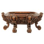 A 19TH-CENTURY CARVED FRUITWOOD ITALIAN OPEN CELLARETTE