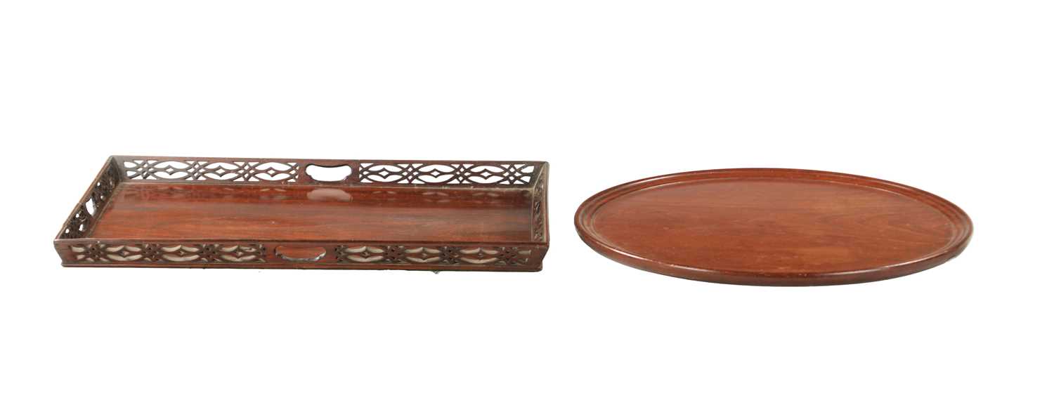AN 18TH CENTURY RECTANGULAR FRETTED GALLERY TRAY TOGETHER WITH A MAHOGANY CIRCULAR TOP