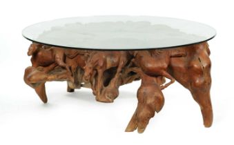A STYLISH CARVED ROOT WOOD COFFEE TABLE
