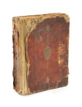 AN EARLY COPY OF THE KORAN LEATHER BOUND BOOK