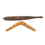 AN ABORIGINAL MULGA WOOD SPEAR THROWER WITH CARVED ANIMALS AND AN OLD BOOMERANG.