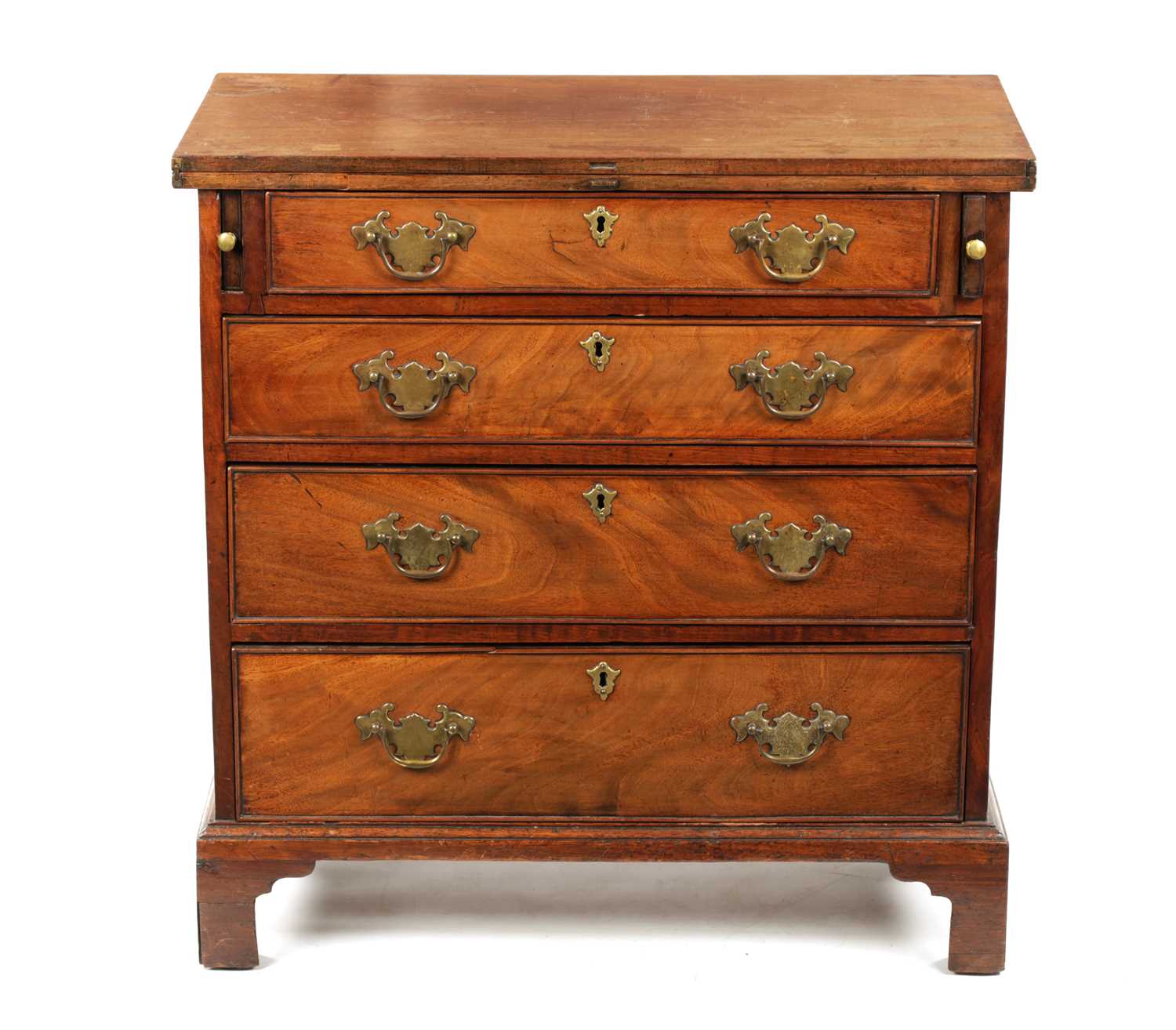 A SMALL GEROGE III FIGURED MAHOGANY BACHELORS CHEST