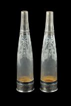 A PAIR OF FRENCH SILVER TOPPED AND CUT GLASS DECANTER BOTTLES