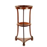 A REGENCY TWO TIER MAHOGANY JARDINIERE STAND WITH BEADED DECORATION