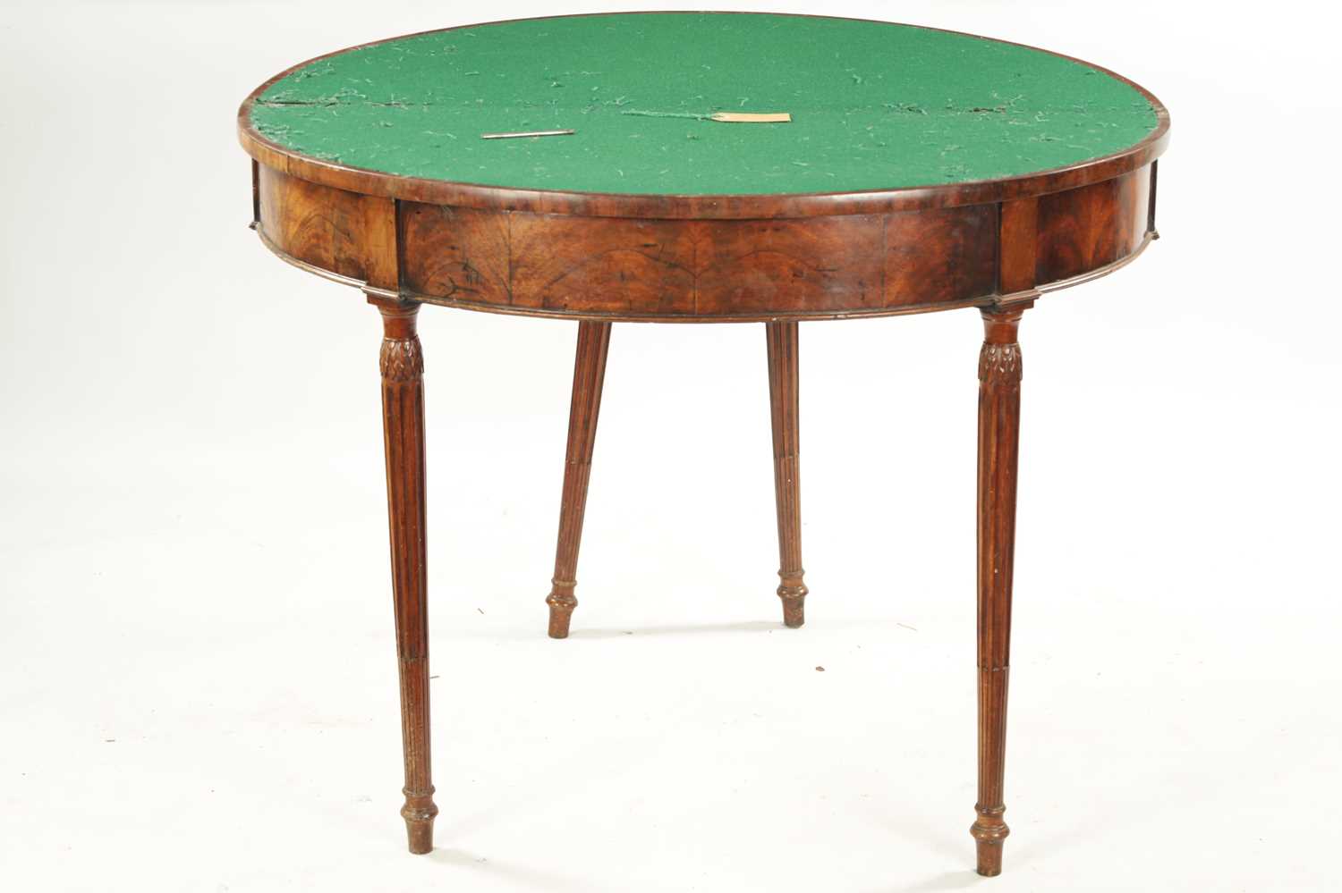 A LATE 18TH CENTURY DEMI LUNE CARD TABLE ON FLUTED LEGS IN THE MANNER OF GILLOWS - Image 6 of 7