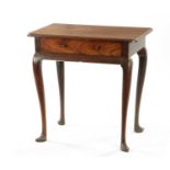 A GEORGE II FIGURED MAHOGANY SIDE TABLE