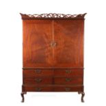 AN UNUSUAL GEORGE II MAHOGANY PRESS CUPBOARD