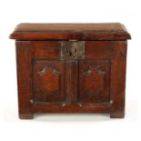 A RARE 17TH CENTURY MINIATURE OAK COFFER