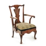 AN 18TH CENTURY FIGURED MAHOGANY COMMODE CHAIR