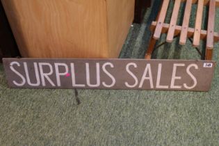 Wooden Surplus Sales sign hand painted