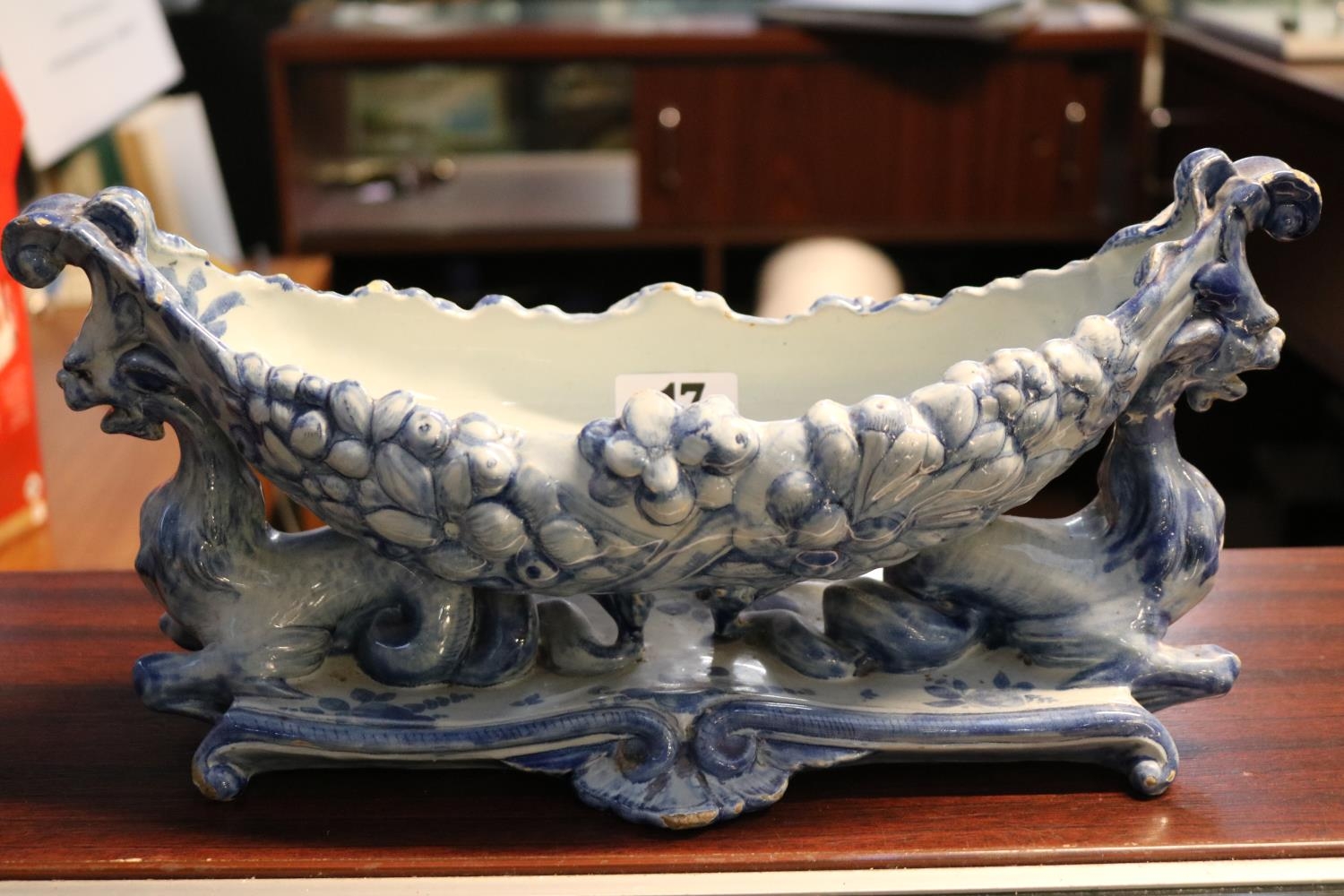 19thC Italian Cantagalli Maiolica table centrepiece in blue glaze with griffin supports. 36cm in
