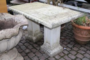 Concrete garden table on square pedestals