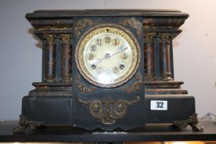 Later Victorian Faux slate mantel clock supported on brass paw feet