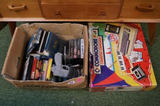 Boxed Commodore 64 and a collection of assorted boxed computer Games