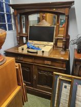 Oak Art Nouveau Mirror backed Dresser with bevel edged mirror over Hammered copper drop handles