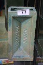 Turquoise model of a London Brick stamped 34 20cm in Height