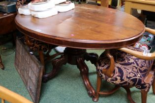 Victorian Mahogany Oval tilt top dining table on 4 Carved legs