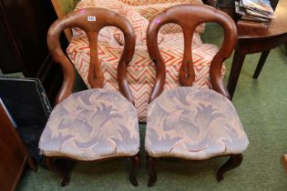 Pair of Victorian Mahogany dining chairs with upholstered seats over French curved legs