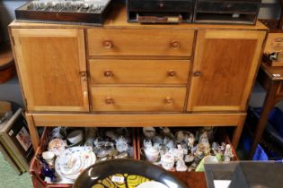 Good quality Mid Century Sideboard of 3 drawers flanked by cupboards above straight supports