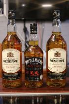 2 Bottles of 1 Litre Special Reserve Oak Aged 3 year Whisky and a bottle of Whyte Mackay Special