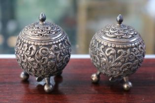 Pair of Anglo Indian Silver Cruets of spherical form supported on ball feet 110g