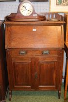 Oak Arts & Crafts Fall front bureau over single drawer and cupboard base