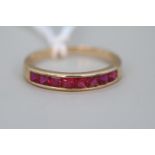 Ladies 9ct Gold Ruby Channel set ring Size O 1.9g total weight